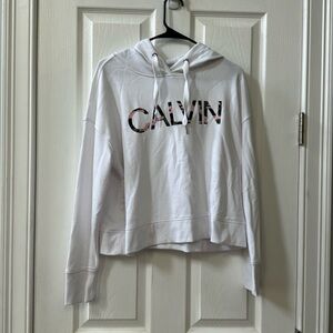 White Calvin Klein hoodie with pink camo writing size womens medium